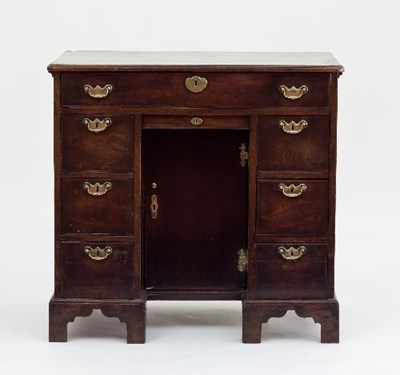 Lot 842 - A George III mahogany kneehole desk, circa...