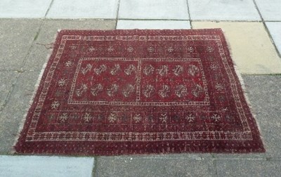 Lot 853 - A Tekke Bokhara rug, two rows of eight guls on...