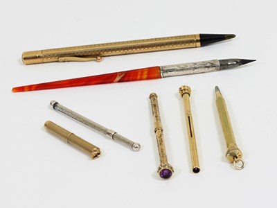 Lot 14 - A silver mounted cornelian pen, a 9ct gold...