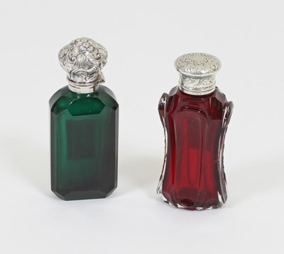 Lot 23 - A green glass scent bottle with scroll...