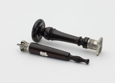 Lot 39 - A miniature ebonised tipstaff with open crown...