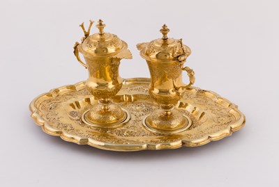 Lot 123 - A pair of Continental silver gilt communion...