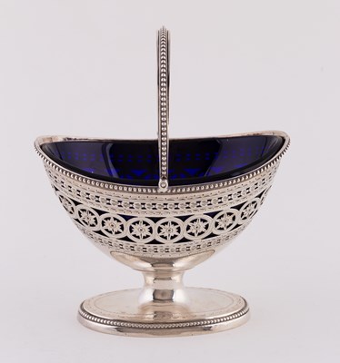 Lot 128 - A George III silver swing handled sugar basket,...