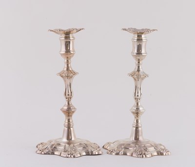 Lot 137 - A pair of George II silver candlesticks, John...