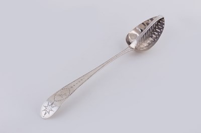 Lot 166 - An Irish silver dividing spoon, John Power,...