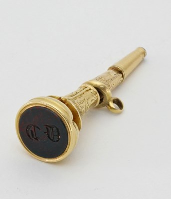 Lot 174 - An 18ct gold watch key/seal, with initials to...