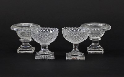 Lot 302 - A pair of Georgian cut glass circular salts...