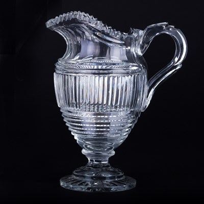 Lot 305 - A Georgian cut glass wine ewer with serrated...