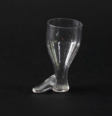 Lot 316 - A late 19th Century glass boot shaped spirit...