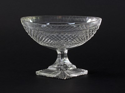 Lot 318 - A cut glass boat shaped dish raised on a...