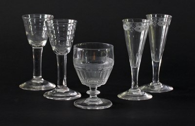 Lot 328 - Two 18th Century wine glasses with ribbed bowl...