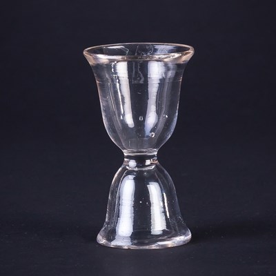 Lot 338 - A George III lead glass double dram glass,...