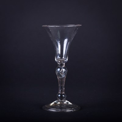 Lot 340 - A George II lead metal wine glass with...