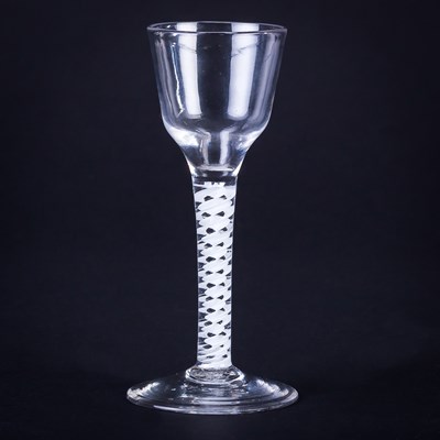 Lot 353 - A Georgian wine glass with funnel bowl on a...