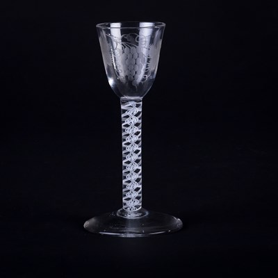 Lot 357 - A Georgian wine glass, the bowl engraved...