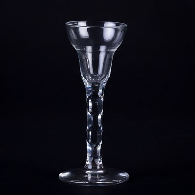 Lot 358 - A Georgian pan-top wine glass on a faceted...