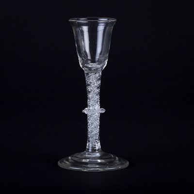 Lot 359 - A Georgian wine glass with funnel bowl on air...