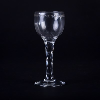 Lot 360 - A Georgian wine glass, the large bowl etched...