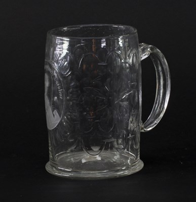 Lot 370 - A Georgian cut glass tankard with oval...