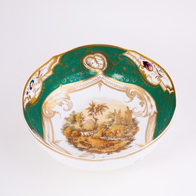 Lot 383 - An English porcelain green ground bowl, the...