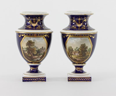 Lot 386 - Two Derby topographical urn shaped vases,...