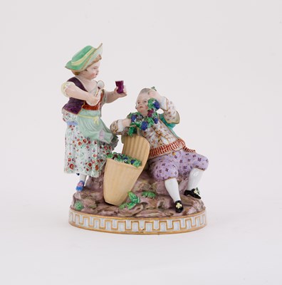 Lot 404 - A Meissen porcelain group of vintners, late...