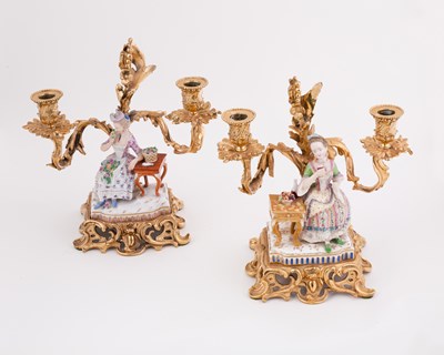 Lot 408 - A pair of porcelain mounted gilt metal...