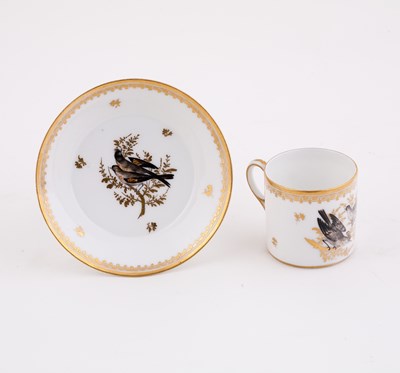 Lot 411 - A French porcelain coffee can and saucer,...