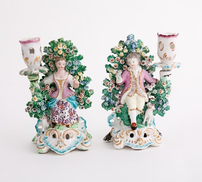 Lot 420 - A pair of Derby figural candlesticks, modelled...