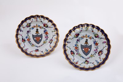 Lot 448 - A pair of Worcester armorial plates, painted...