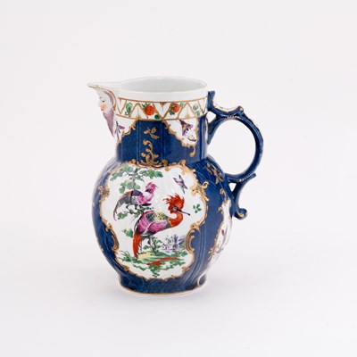 Lot 457 - A Worcester cabbage-leaf jug with mask spout,...