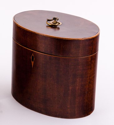 Lot 489 - A George III mahogany oval tea caddy, with...