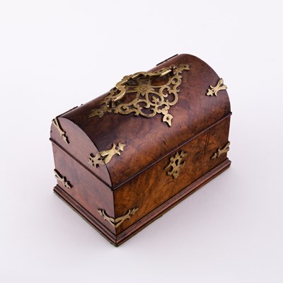 Lot 493 - A Victorian walnut tea caddy, with brass...