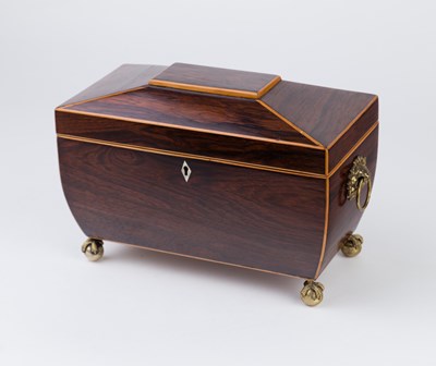 Lot 520 - A Regency rosewood sarcophagus shaped tea...