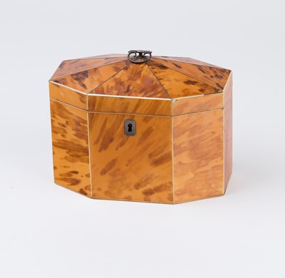 Lot 525 - A George III blonde tortoiseshell tea caddy of...