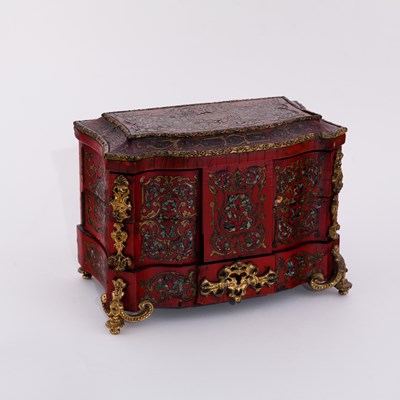 Lot 535 - A late 19th Century red lacquer and brass...