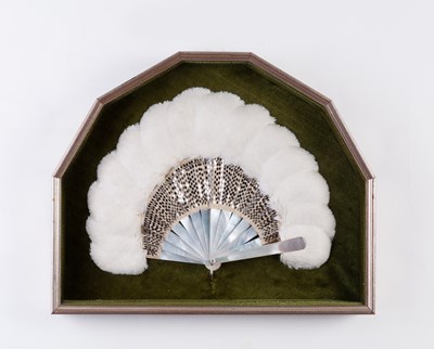 Lot 585 - An ostrich feather fan with sequined...