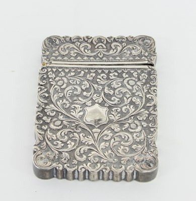 Lot 3 - An Indian white metal card case chased with...