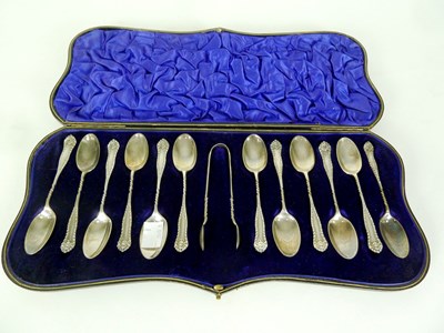 Lot 22 - Twelve silver teaspoons, Walker & Hall,...