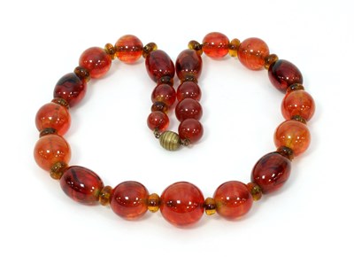 Lot 61 - A twenty-two bead agate necklace