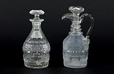 Lot 75 - A Georgian cut glass claret jug and stopper...