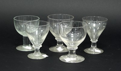 Lot 91 - A pair of cut glass rummers with knopped stems...