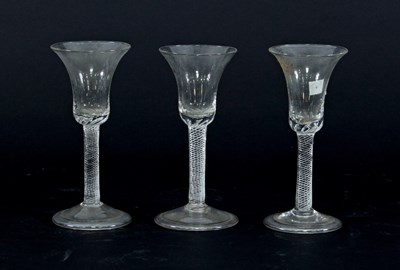 Lot 98 - Three 18th Century wine glasses with airtwist...