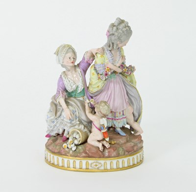 Lot 119 - A 19th Century Meissen group of a lady, two...