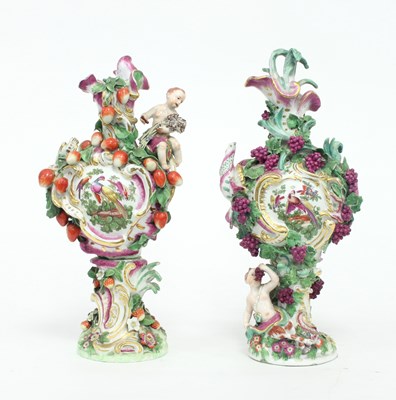 Lot 137 - A pair of Continental figural vases, circa...