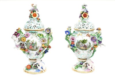 Lot 143 - A pair of Meissen flower-encrusted pot pourri...