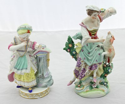 Lot 148 - A Meissen style figure of a woman holding an...