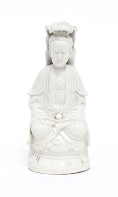 Lot 170 - A Chinese blanc-de-chine figure of Guanyin,...