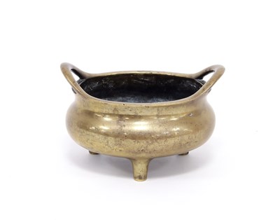 Lot 182 - A Chinese bronze censer, reign marks beneath,...