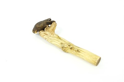 Lot 187 - A Japanese carved bone parasol handle, circa...